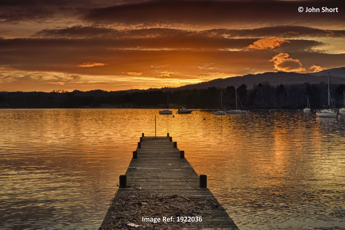 Dock On Lake Windermere At Sunset; Ambleside, Cumbria, England