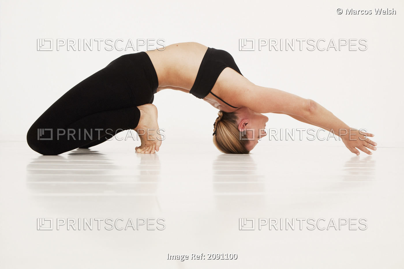 A woman in a yoga pose;Tarifa cadiz andalusia spain