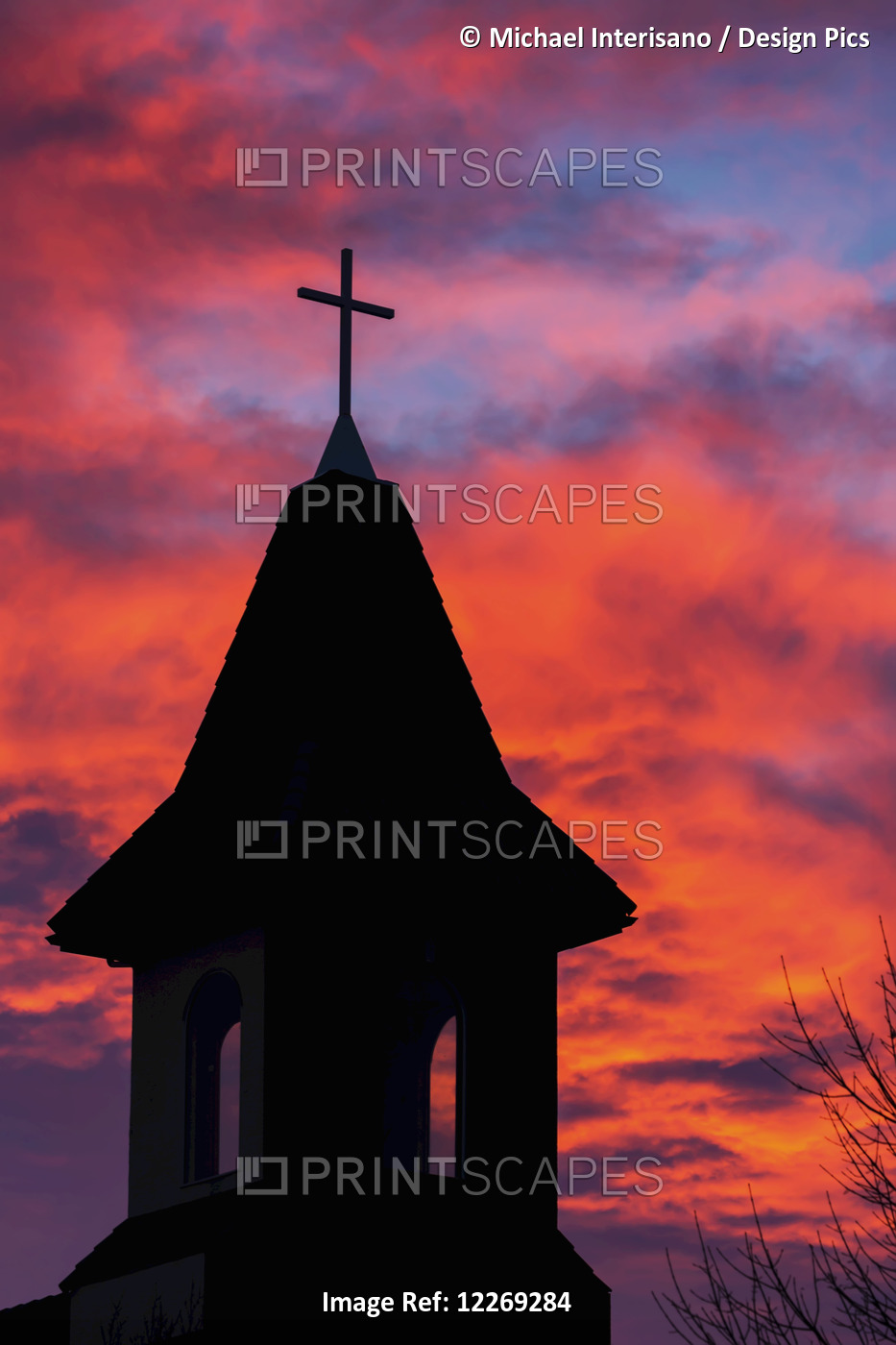 Silhouette Of A Church Steeple With Colourful Clouds And Blue Sky In The ...
