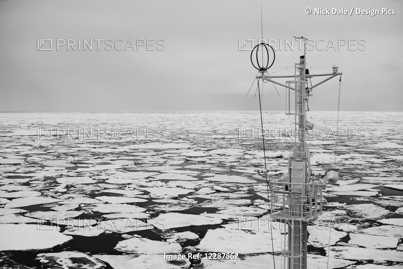 Mast Of A Ship In The Sea Filled With Floating Ice; Spitsbergen, Svalbard, ...