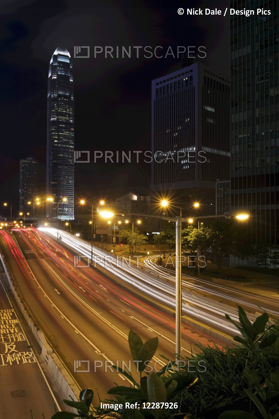 Streaks Of Light From Traffic Outside Skyscraper; Hong Kong, China