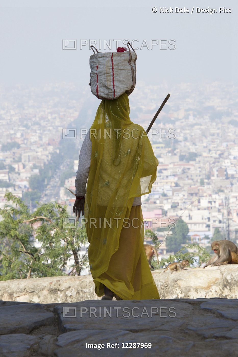 Woman Carrying Bag On Head; Dharpatha Mal, Madhya Pradesh, India