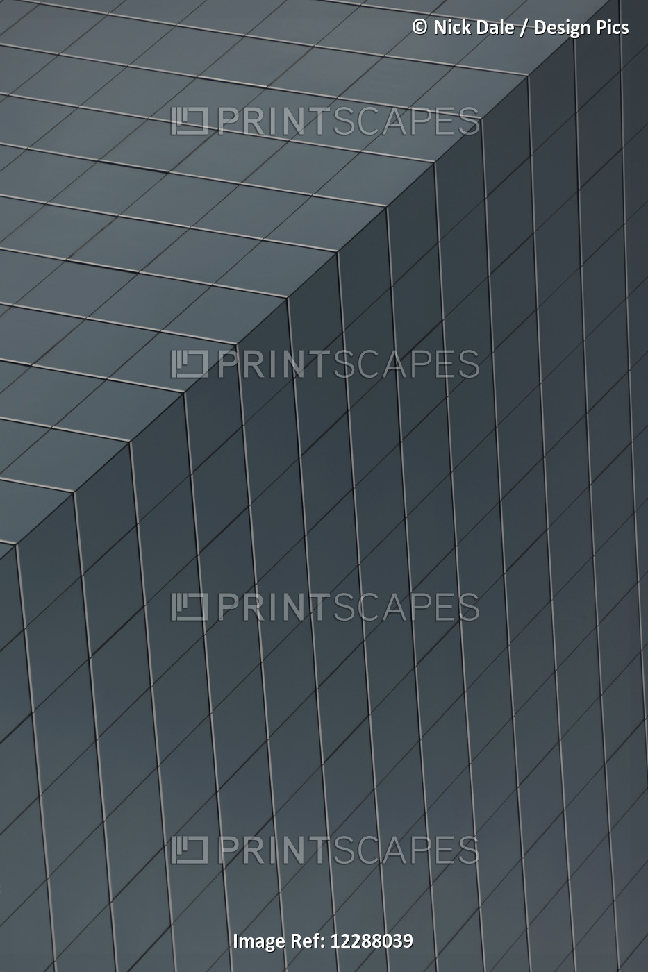 Geometric Pattern Of Windows On Grey Skyscraper; Hong Kong, China