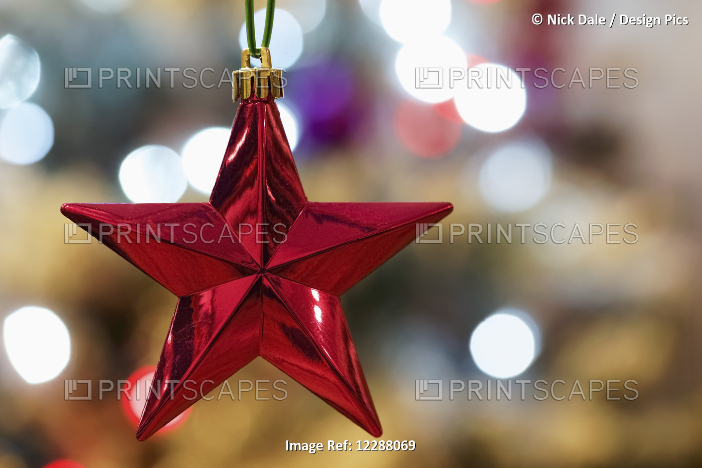Red Christmas Tree Star With Bokeh Lights; London, England