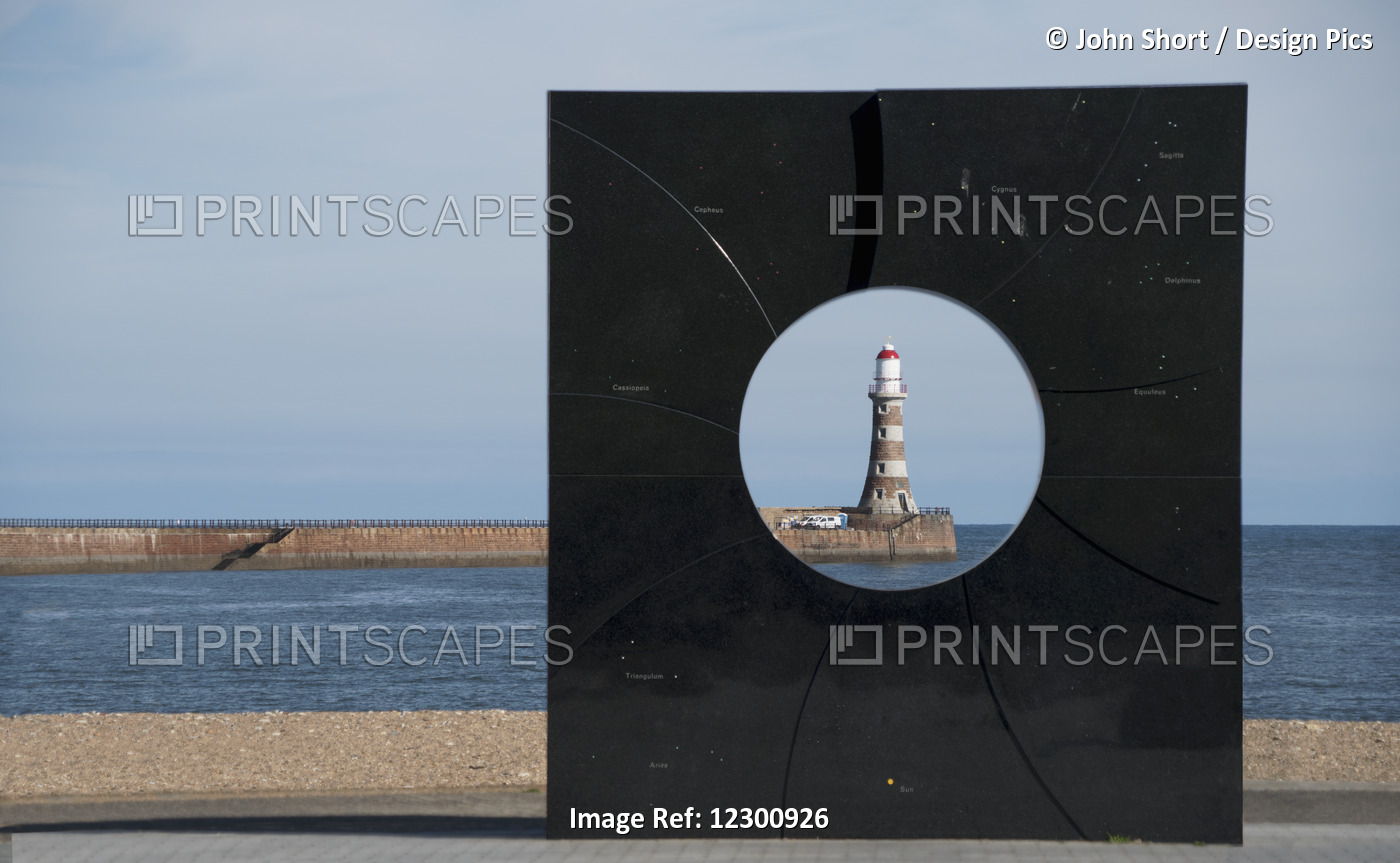 A Lighthouse Viewed Through A Round Hole In A Black Sculpture; Sunderland, Tyne ...
