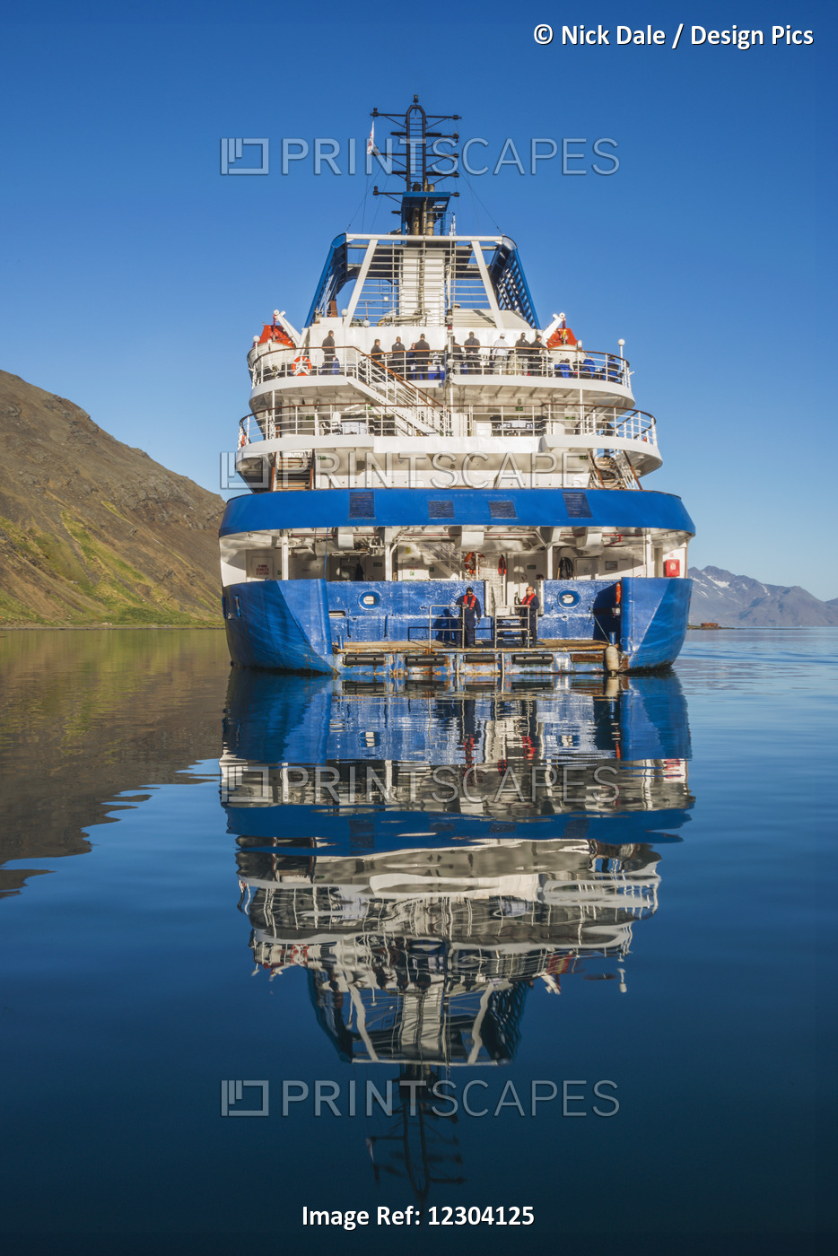Reflection Of Cruise Ship In Calm Water; Antarctica