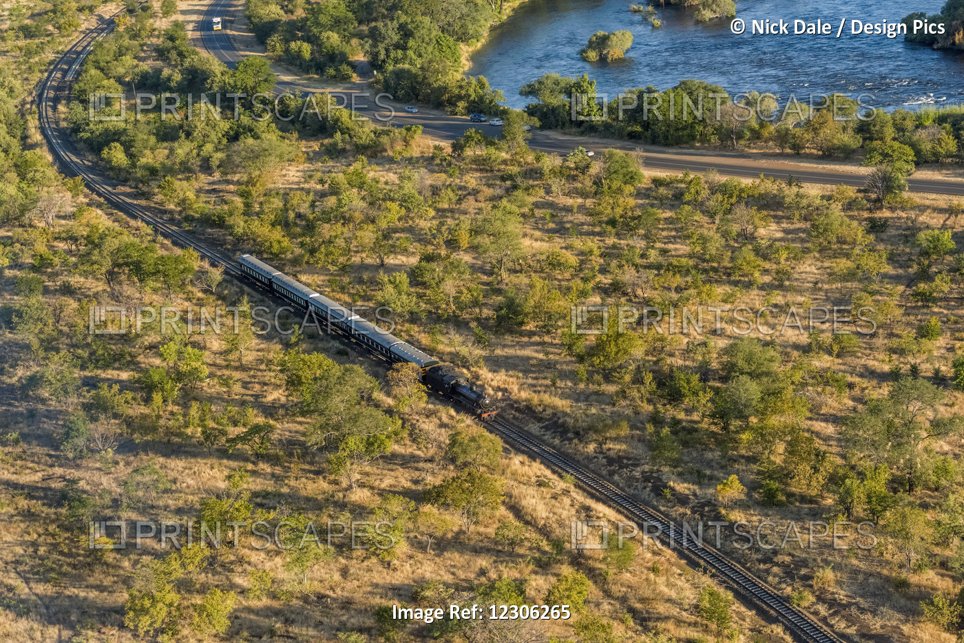 Aerial View Of Steam Train Beside Zambezi; Botswana
