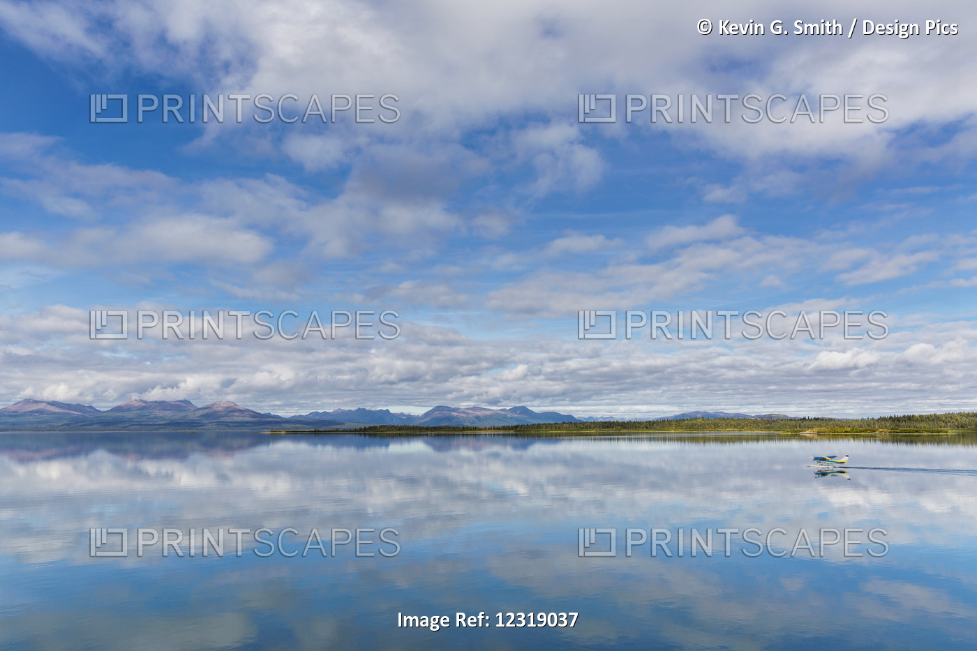 Light Clouds Reflect On The Calm Water Of Tikchik Lake At The Tikchik Narrows ...