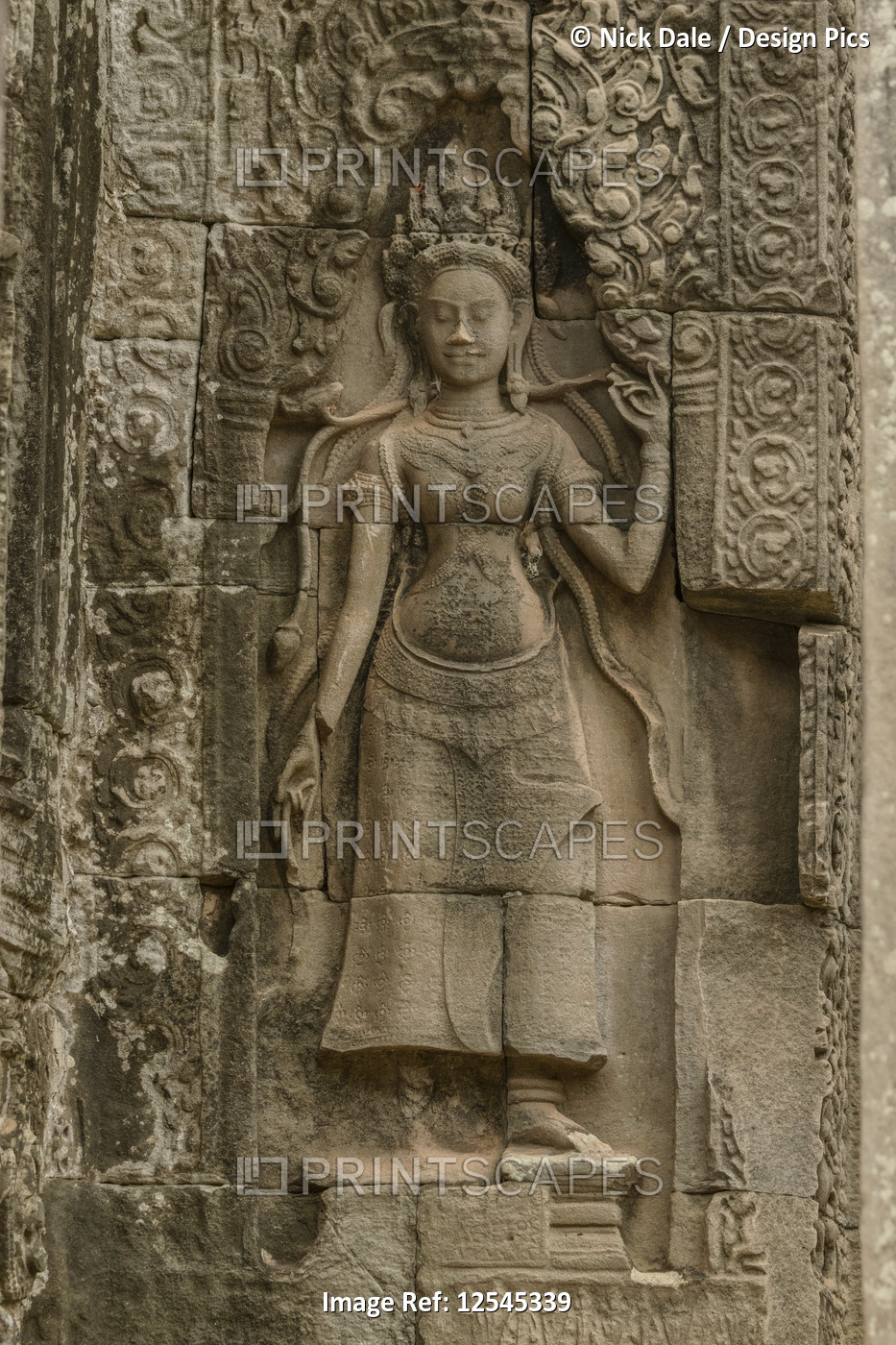 Sculpture of woman at ruined Bayon temple, Angkor Wat; Siem Reap, Siem Reap ...
