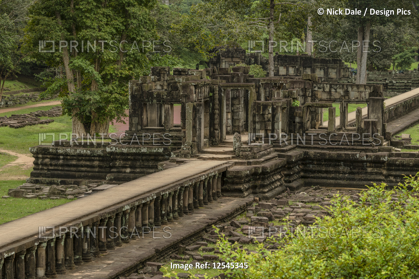 Stone causeway leads to ruined Baphuon temple, Angkor Wat; Siem Reap, Siem Reap ...