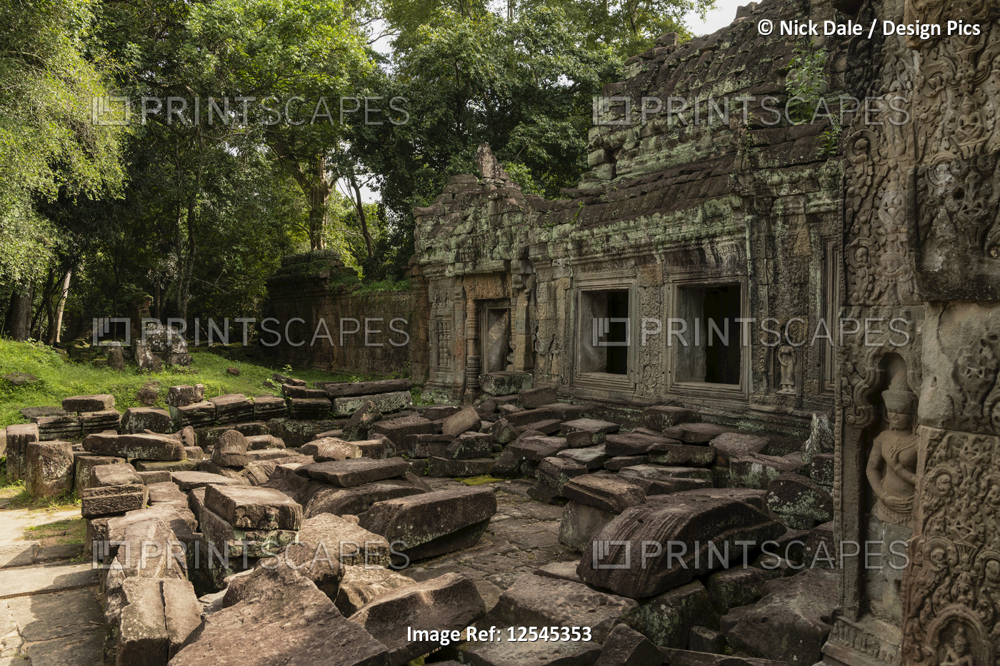 Temple courtyard littered with fallen stone blocks, Preah Khan, Angkor Wat; ...