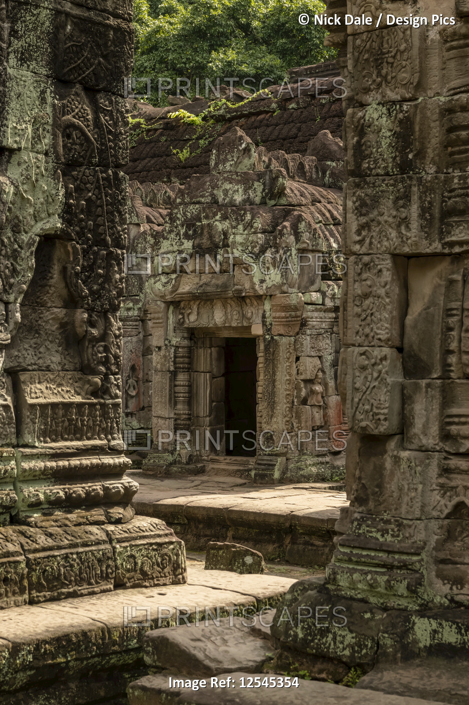 Temple entrance between corners of stone buildings, Preah Khan, Angkor Wat; ...