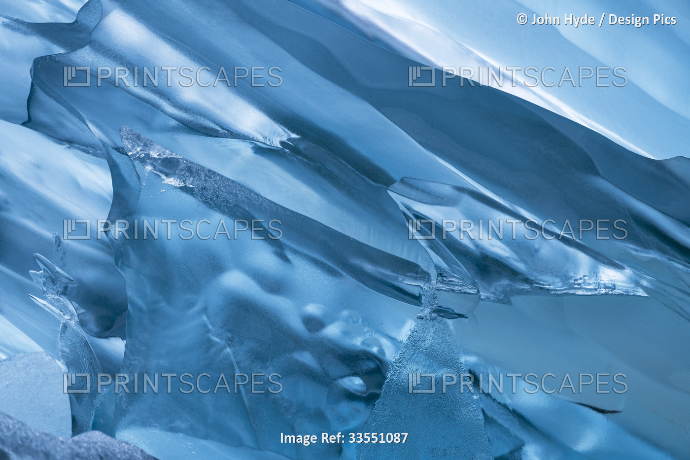 Close-up of iceberg and blue, natural ice sculpture in Tracy Arm in Tongass ...
