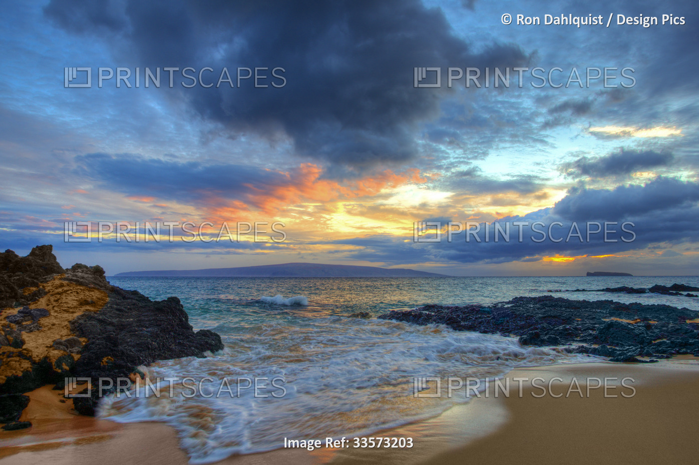 Beautiful sunset at twilight at Maui Wai or Secret Beach; Makena, Maui, Hawaii, ...